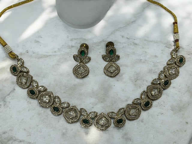 Premium finish Tyaani Kundan Necklace set with earrings in White and Emerald Green