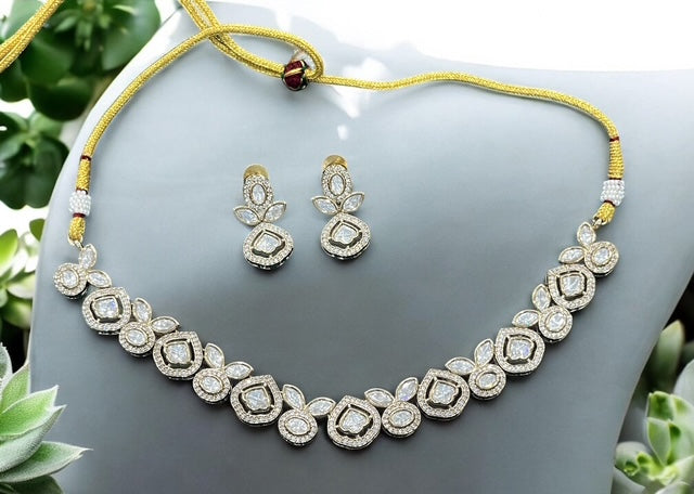 Premium finish Tyaani Kundan Necklace set with earrings in White and Emerald Green