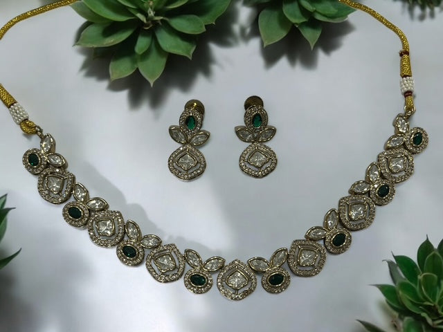 Premium finish Tyaani Kundan Necklace set with earrings in White and Emerald Green
